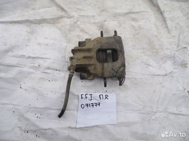 Суппорт тормозной передний правый Ford Focus I 199