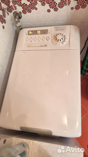 Стиральная машина с вертикальной загрузкой