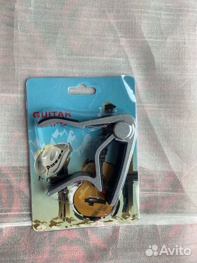 Каподастр для гитары