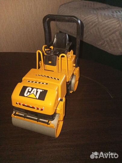 Детский асфальтоукладчик фирмы Bruder