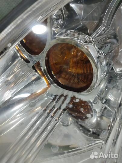 Фара левая Mitsubishi Lancer 9 2007