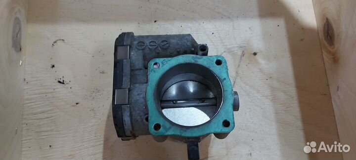 Дроссельная заслонка Vw Audi 1.8t 06A133062C