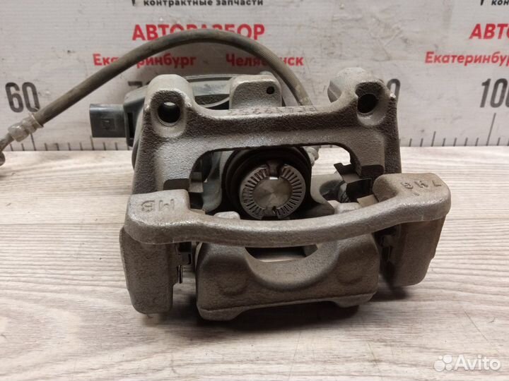 Суппорт тормозной задний правый Kia Sportage QL