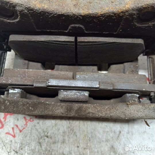 Суппорт тормозной передний правый Nissan X Trail