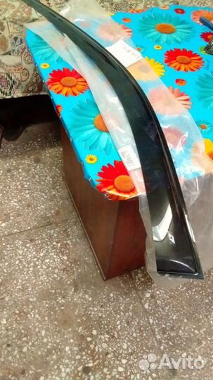 Ветровик левый передний на Мицубиси рвр