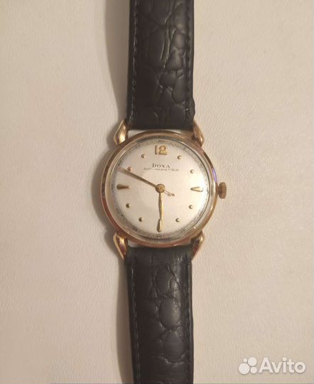 Золотые часы Doxa