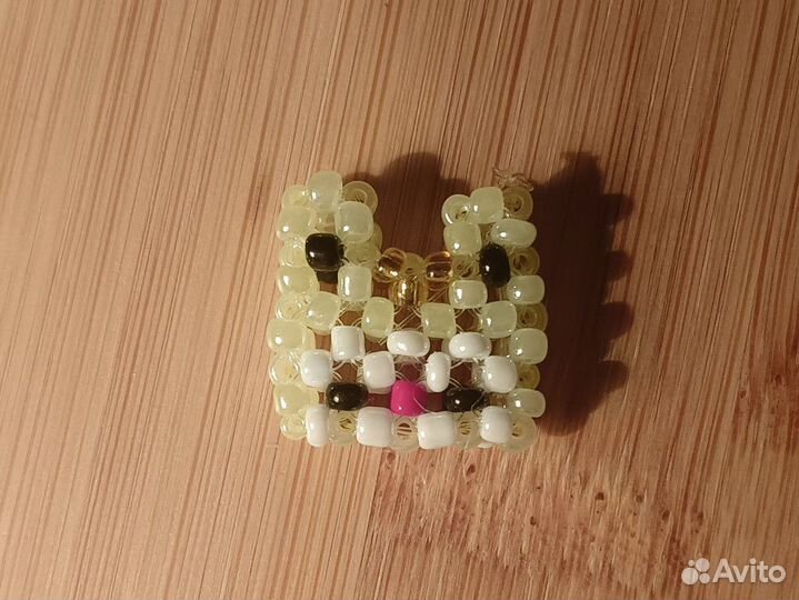 Фигурки кошек из бисера