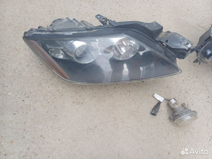 Передние фары на мазда сх7 2010г