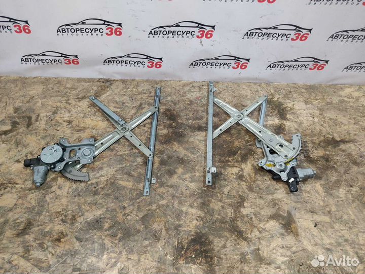 Стеклоподъемник передней двери Митсубиси Лансер 10