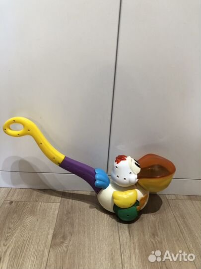 Детская каталка пеликан