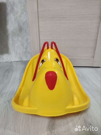 Собака качалка