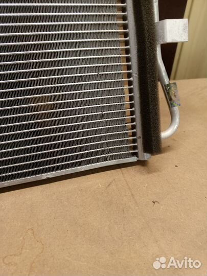 Радиатор кондиционера Kia 976061D110