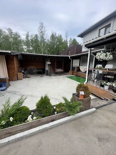 Коттедж 244 м² на участке 4,5 сот.