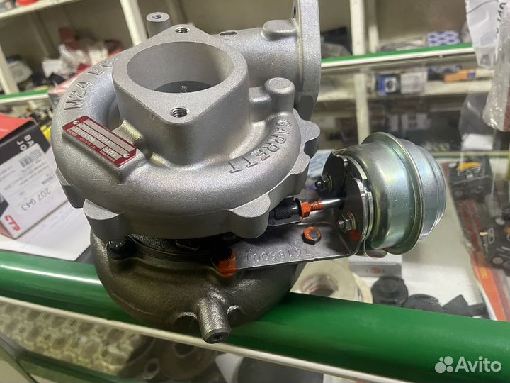 Новая Турбина оригинал Nissan 14411-EC00E Garrett