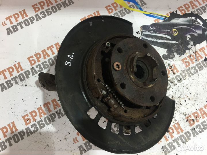 Фольксваген Цапфа задняя левая (кулак) Лев