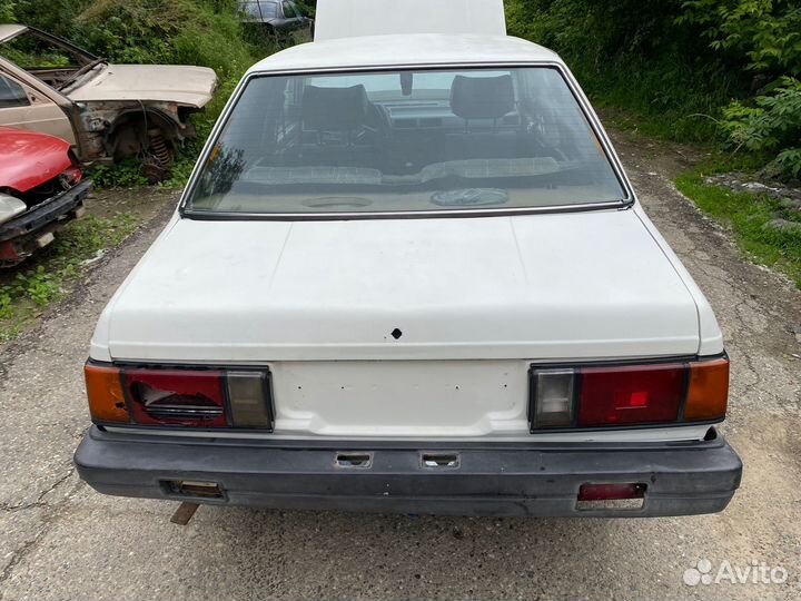 Крышка багажника Nissan Sunny B11