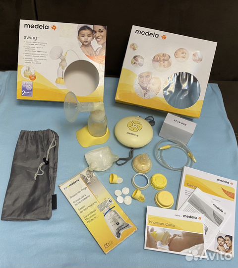 Молокоотсос medela электрический