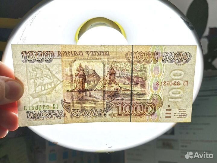 Купюры 1000 и 5 Россия