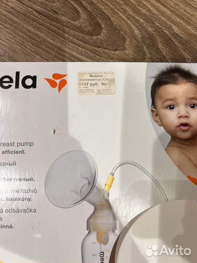 Молокоотсос medela электрический