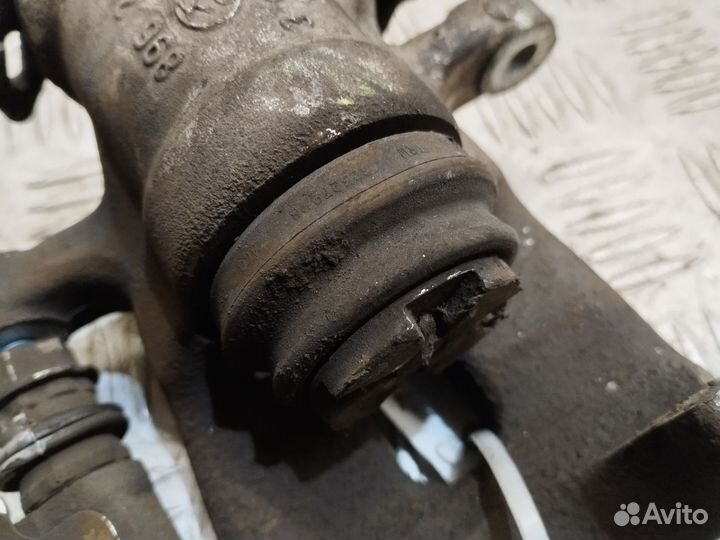 Суппорт задний левый Opel Zafira B