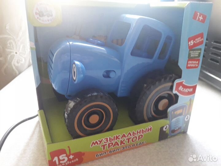 Игрушка Музыкальный синий трактор