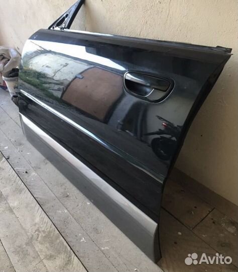 Дверь на Subaru Outback
