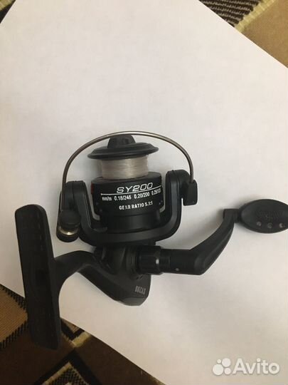 Катушка рыболовная инерционная