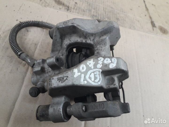 Суппорт тормозной задний левый Mercedes-Benz