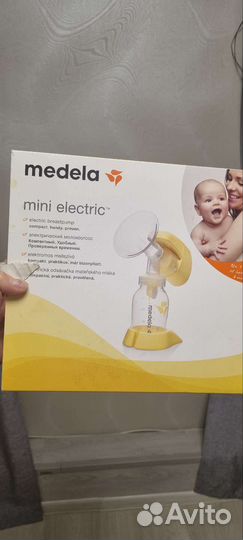 Молокоотсос medela электрический