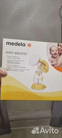 Молокоотсос medela электрический