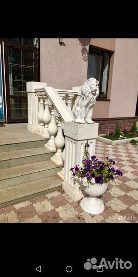 Статуя льва