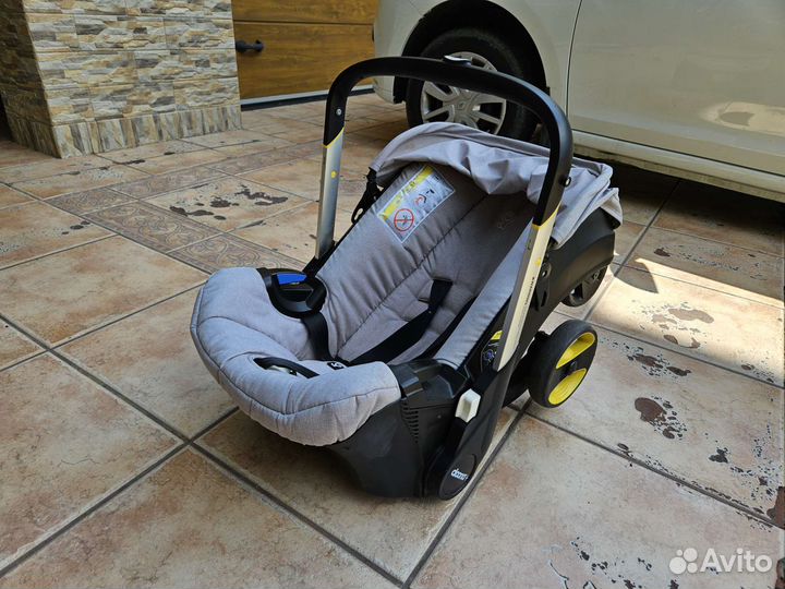 Коляска автолюлька doona