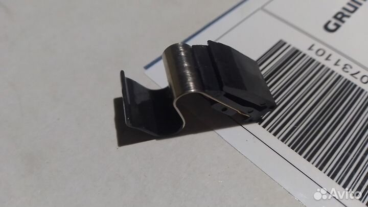 Пружина лючка бензобака Мицубиси