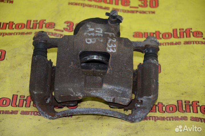 Суппорт тормозной передний левый Chevrolet Aveo