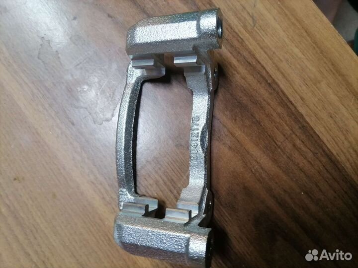 Скоба суппорта заднего solaris kia BC412178