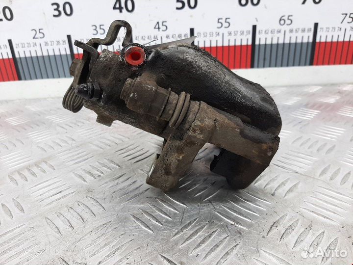 Суппорт задний левый для Opel Zafira B 93183696