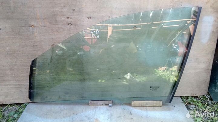 Стекло двери передней левой Опель Омега Б