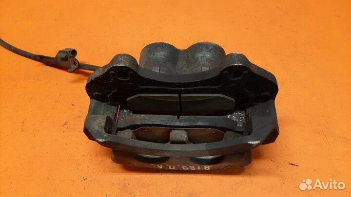 Суппорт тормозной передний левый Cadillac Cts 2009