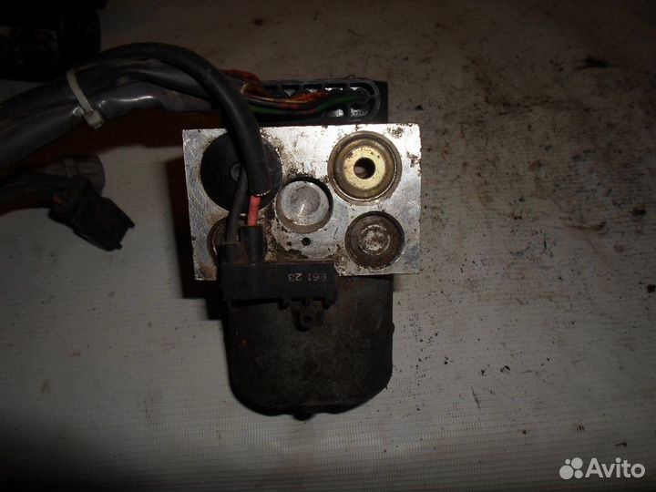 Блок ABS (насос) (Nissan Primera)