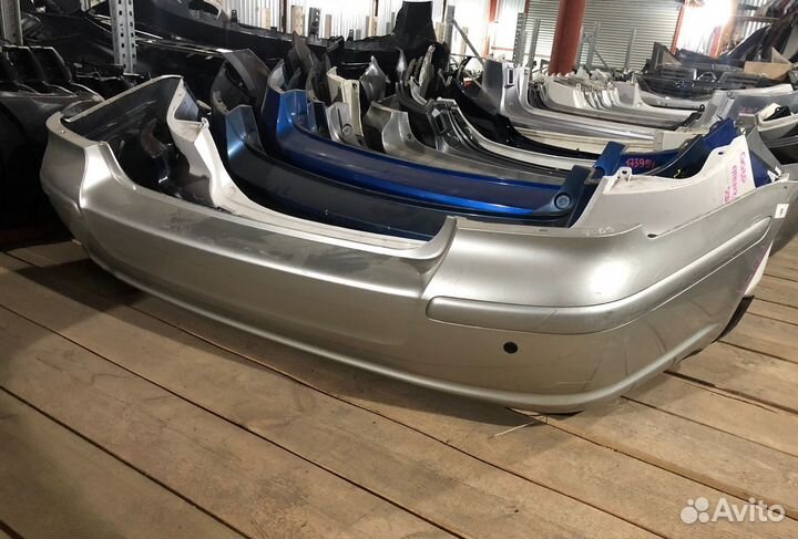 Бампер задний Toyota Avensis T250 Тойота Авенсис