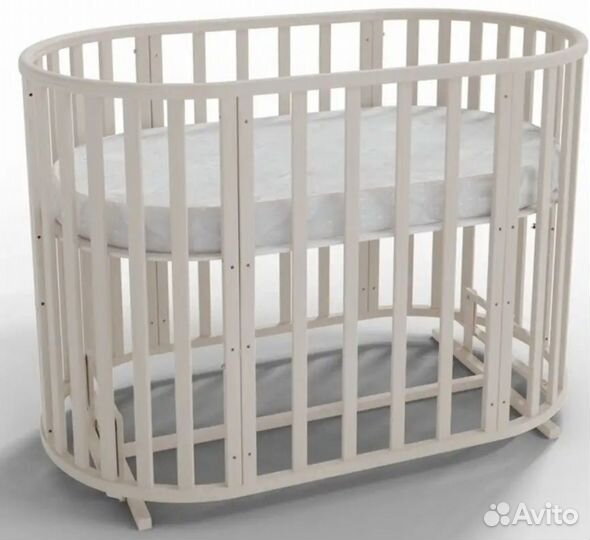 Детская кроватка с маятником