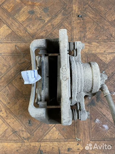 Chevrolet lacetti супорт тормозной передний правый