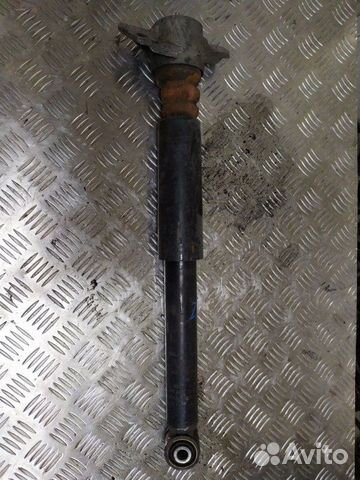 Стойка амортизатора задняя Volkswagen Passat B6