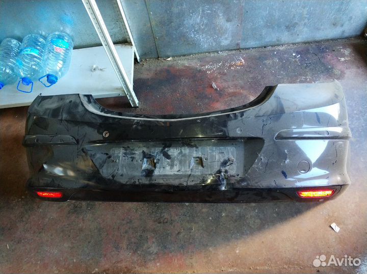 Бампер задний Nissan Tiida