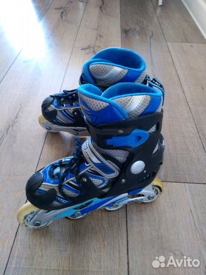 Коньки роликовые