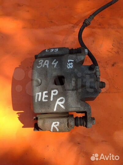 Суппорт тормозной передний правый Nissan Teana L3