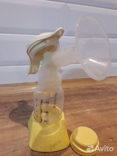 Молокоотсос Мedela