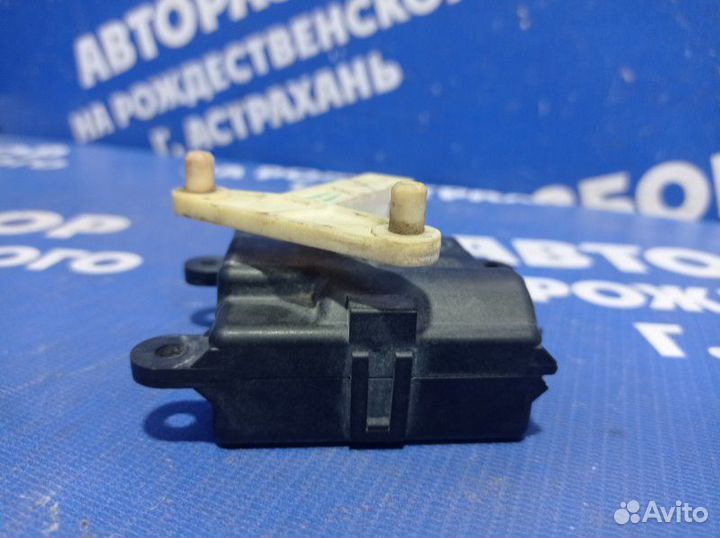Моторчик заслонок отопителя Nissan Almera N16