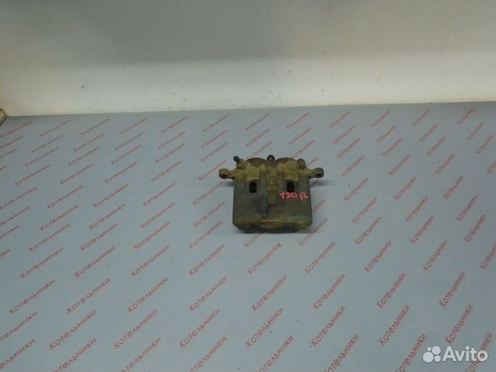 Nissan 41011-8H300 Суппорт тормозной левый