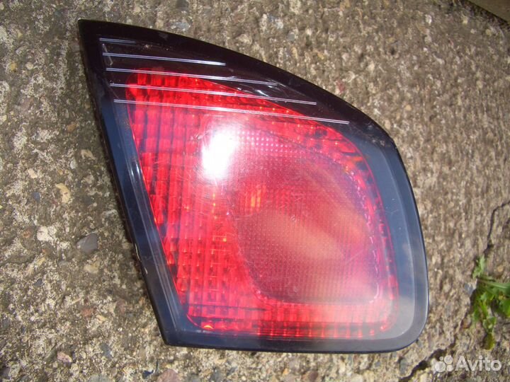 Фонарь внутренний левый Ниссан Примера с99-02г